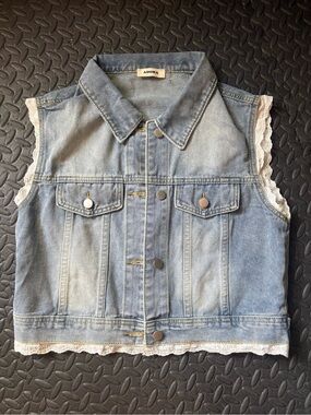 Denim vest with lace trim by Adora!